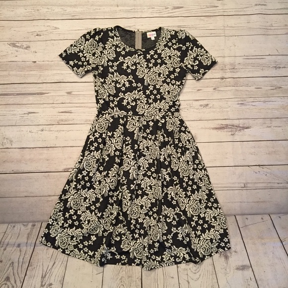 LuLaRoe Dresses & Skirts - Vintage Black & White Rose LulaRoe Amelia dress